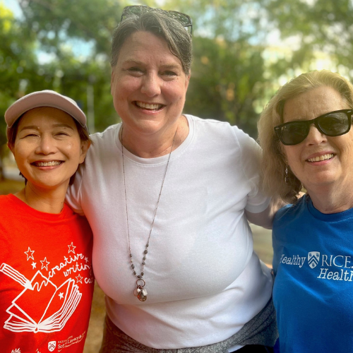 Kelly Fox and two Rice employees at an engagement event
