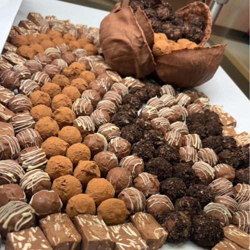 assorted chocolate truffles with a large chocolate center piece