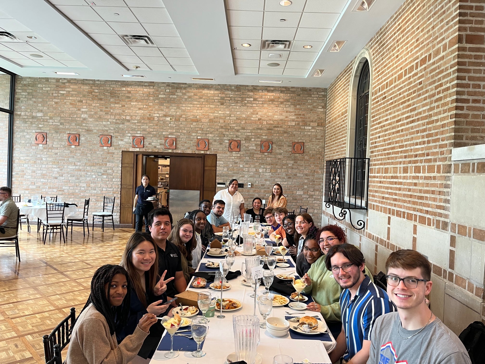 ice’s Summer Conference Associates gather at Cohen House to enjoy a meal, fostering community and sharing memorable experiences.