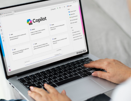 someone utilizing copilot on a laptop