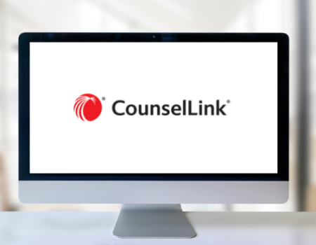 a desktop computer with the CounselLink logo on the screen