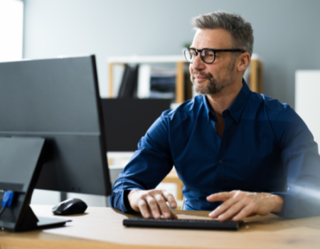 Man looking at a computer screen