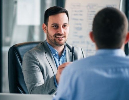 A manager and his employee having a conversation