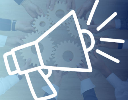 megaphone overlayed on a picture of wooden gears