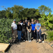 Students and staff gathered at the garden for a farm side cooking event 