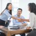 Colleagues shaking hands in agreement