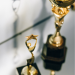 two gold award trophies